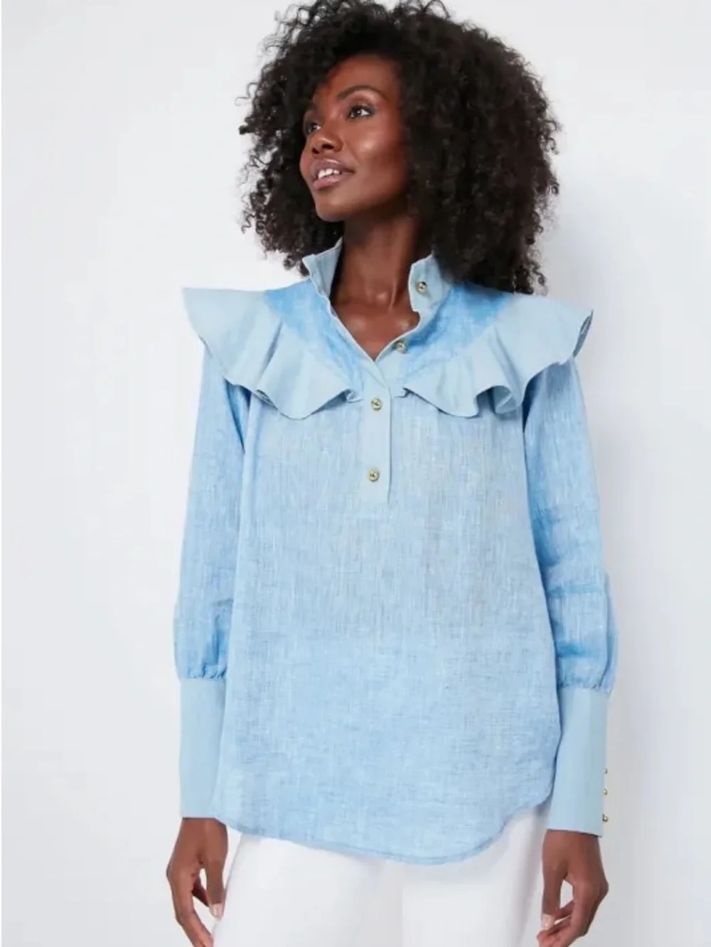Tuckernuck Mirabella ruffle bib blouse in chambray blue linen.